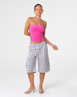 Woman wearing Lamar Towelling Skimmer Tube Top in Fuchsia Pink