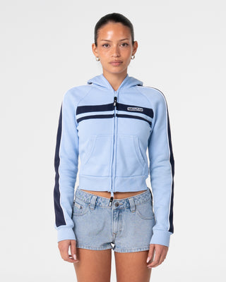 Woman wearing Retro Lines Zip Through Hooded Fleece in Retro Blue