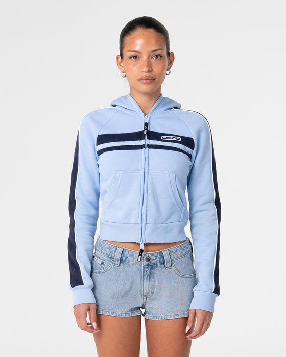 woman-wearing-retro-lines-zip-through-hooded-fleece-in-retro-blue