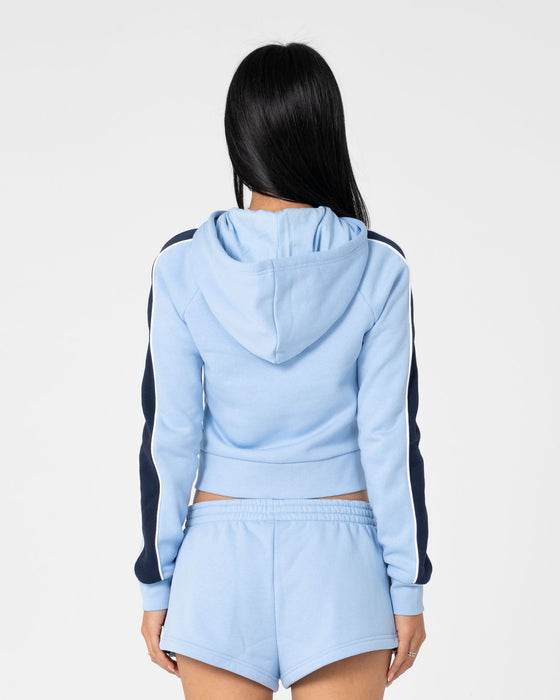 woman-wearing-retro-lines-zip-through-hooded-fleece-in-retro-blue
