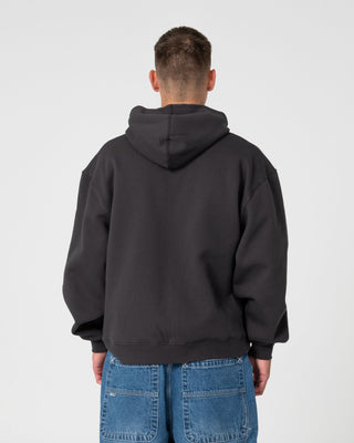 Man wearing Monty 2.0 Zip Thru Hooded Fleece in Carbon