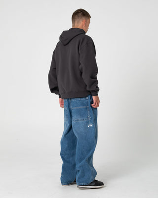Man wearing Monty 2.0 Zip Thru Hooded Fleece in Carbon