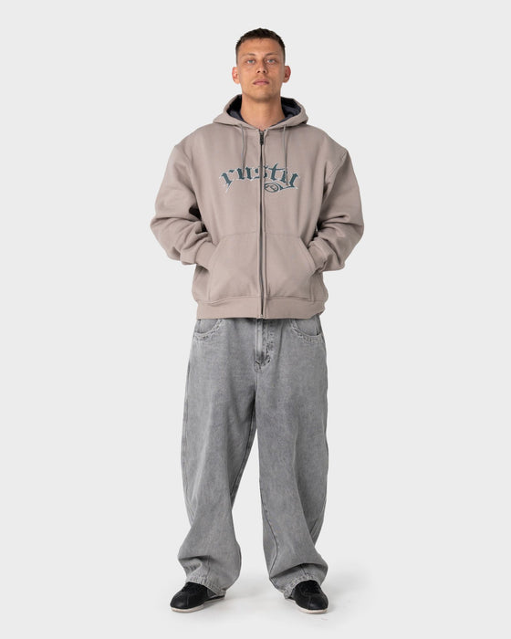 man-wearing-monty-2-0-zip-thru-hooded-fleece-in-stone