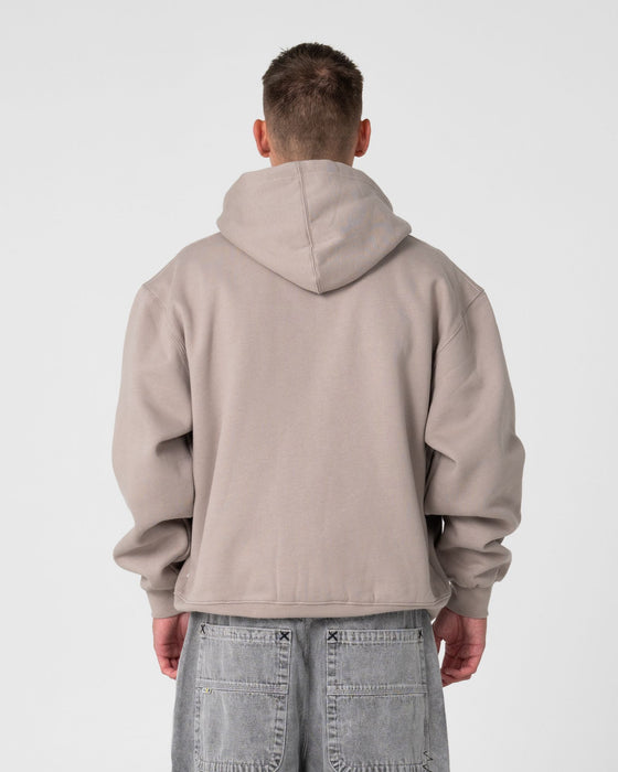 man-wearing-monty-2-0-zip-thru-hooded-fleece-in-stone