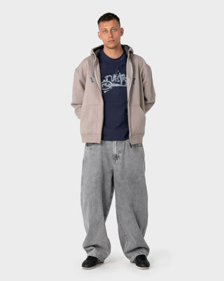 Man wearing Monty 2.0 Zip Thru Hooded Fleece in Stone
