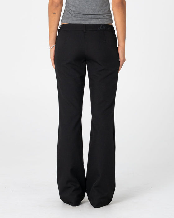 woman-wearing-finance-mummy-low-rise-suit-pant-in-black-2