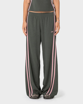 Woman wearing Sister Bronson Low Rise Wide Leg Pant in Savanna / Pink A Boo