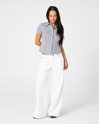 Woman wearing Work It Low Rise Cargo Pant in Snowy White