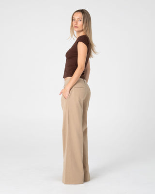 Woman wearing Beverley Low Rise Pant in Abbey Stone