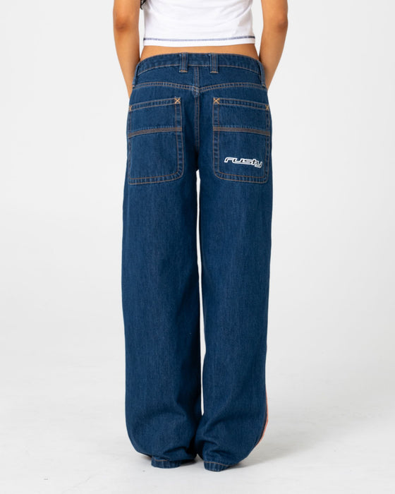 woman-wearing-flip-mommy-low-rise-wide-leg-jean-2-0-in-deep-sea-blue-orange
