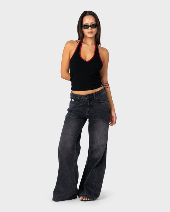 woman-wearing-wendy-wide-low-rise-denim-jean-2-0-in-blasted-black