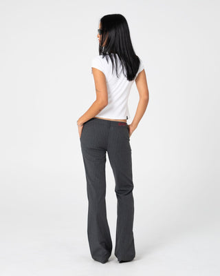 Woman wearing Finance Mummy Pin/S Low Rise Suit Pant in Grey Pin Stripe