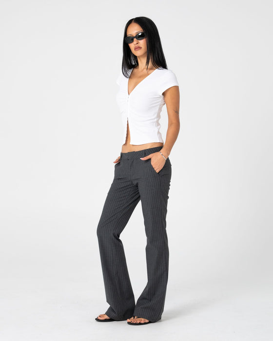 woman-wearing-finance-mummy-pin-s-low-rise-suit-pant-in-grey-pin-stripe