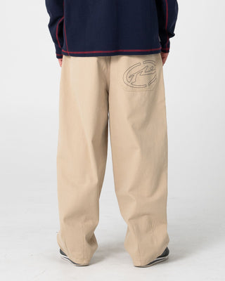 Man wearing Enigma Pleated Pant in Abbey Stone