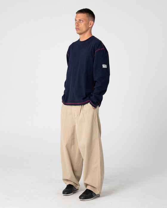 man-wearing-enigma-pleated-pant-in-abbey-stone