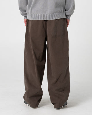 Man wearing Enigma Pleated Pant in Seaweed