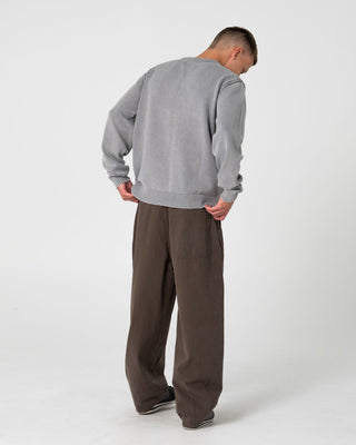 Man wearing Enigma Pleated Pant in Seaweed