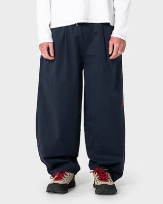 man-wearing-bullistic-elastic-pant-in-navy-blue