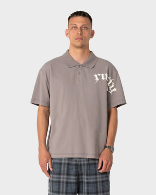 Man wearing Blinker Short Sleeve Polo in Abbey Stone