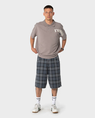 Man wearing Blinker Short Sleeve Polo in Abbey Stone