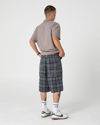 Man wearing Blinker Short Sleeve Polo in Abbey Stone