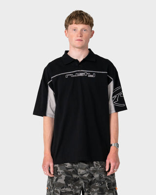 Man wearing Cyberwave Short Sleeve Polo in Black