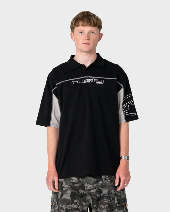 man-wearing-cyberwave-short-sleeve-polo-in-black