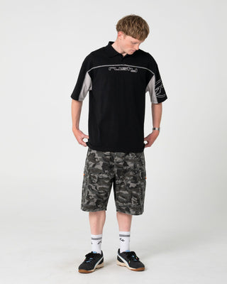 Man wearing Cyberwave Short Sleeve Polo in Black
