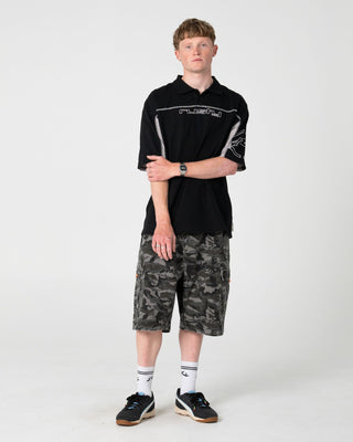 Man wearing Cyberwave Short Sleeve Polo in Black