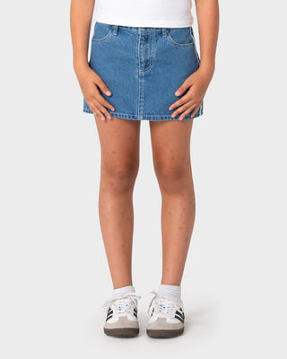 Girl wearing Flip Girl Mini Denim Skirt in Middy Blue / Blue