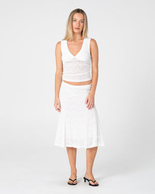 Woman wearing Roma Low Rise Lace Midi Skirt in White