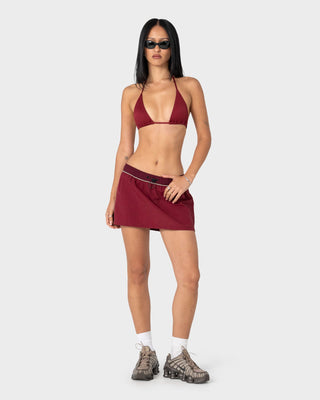 Woman wearing Breezy Wind Cheater Mini Skirt in Cranberry
