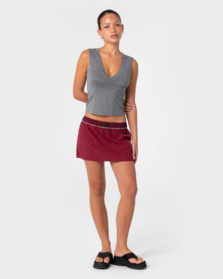 Woman wearing Breezy Wind Cheater Mini Skirt in Cranberry