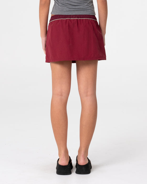 woman-wearing-breezy-wind-cheater-mini-skirt-in-cranberry