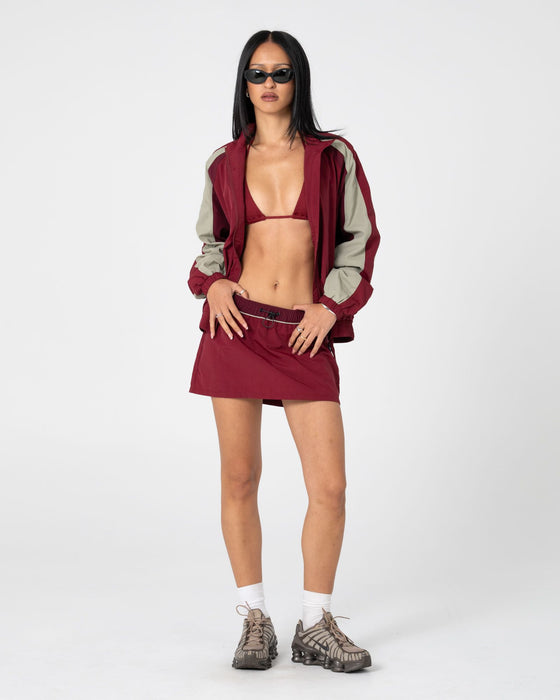woman-wearing-breezy-wind-cheater-mini-skirt-in-cranberry