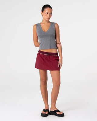 Woman wearing Breezy Wind Cheater Mini Skirt in Cranberry