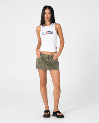 Woman wearing Alley Low Rise Denim Mini Skirt in Savanna