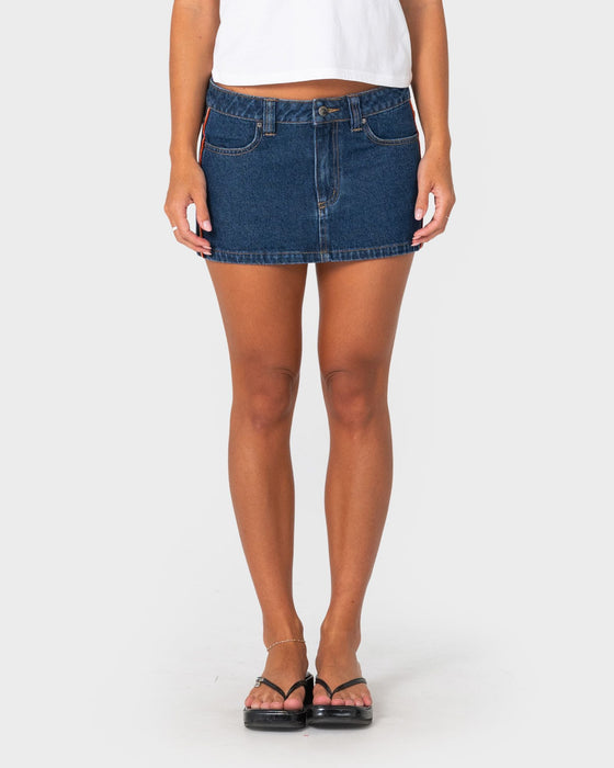 woman-wearing-flip-mommy-low-rise-mini-denim-skirt-2-0-in-deep-sea-blue-orange
