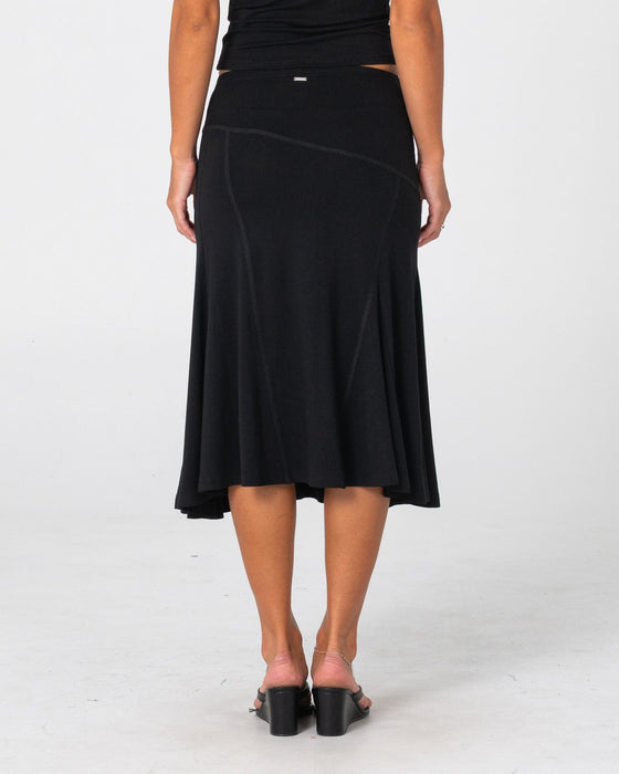 woman-wearing-vixen-low-rise-midi-skirt-in-black