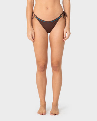 Woman wearing La Cabana Brazilian Side Tie Bikini Pant in Java