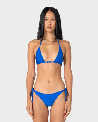 Woman wearing Shadow Multiway Ring Bikini Top in Cobalt Blue