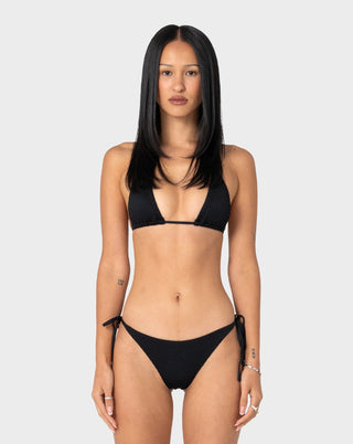 Woman wearing Cedar Multiway Bikini Top in Black