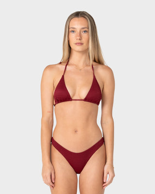 Woman wearing Cedar Multiway Bikini Top in Cranberry