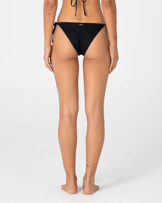 woman-wearing-cedar-midi-side-ties-bikini-bottom-in-black
