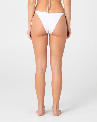 Woman wearing Cedar Midi Side Ties Bikini Bottom in White
