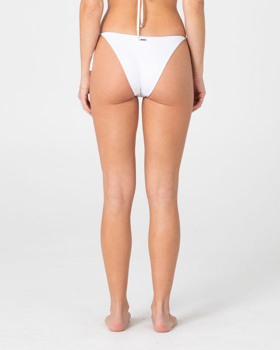 woman-wearing-cedar-midi-side-ties-bikini-bottom-in-white
