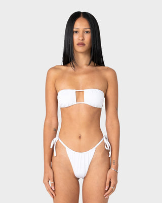 Woman wearing Cedar Bandeau Open Front Bikini Top in White
