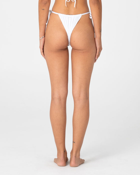 woman-wearing-cedar-cheeky-side-ties-bikini-bottom-in-white