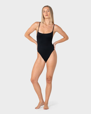 Woman wearing Cedar Hi Leg One Piece in Black