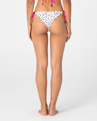 Woman wearing Miss Dot Brazilian Bikini Bottom in Cream / Black R Dot